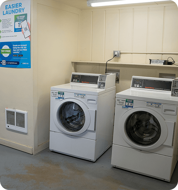 Shared laundry room washers and dryers at Parker House Employee Housing